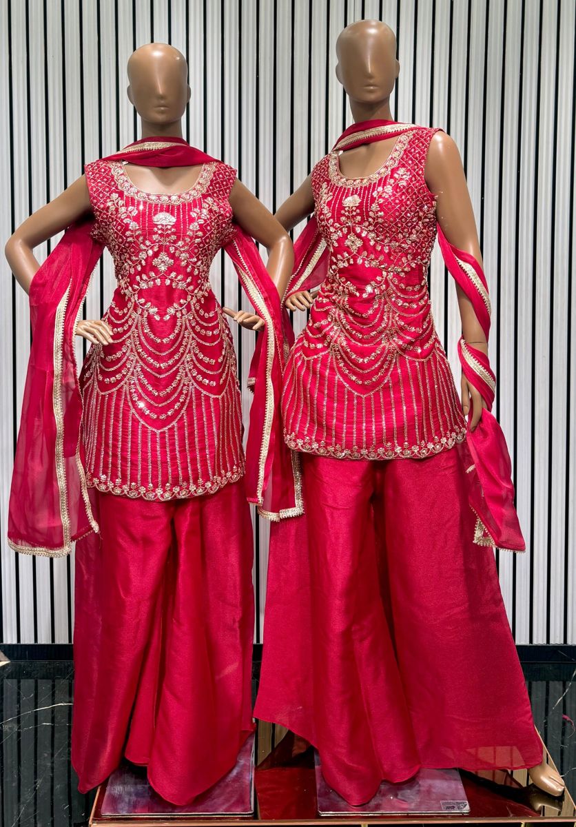 Two magenta embroidered kurta and plazo sets with beadwork waterfall detailing