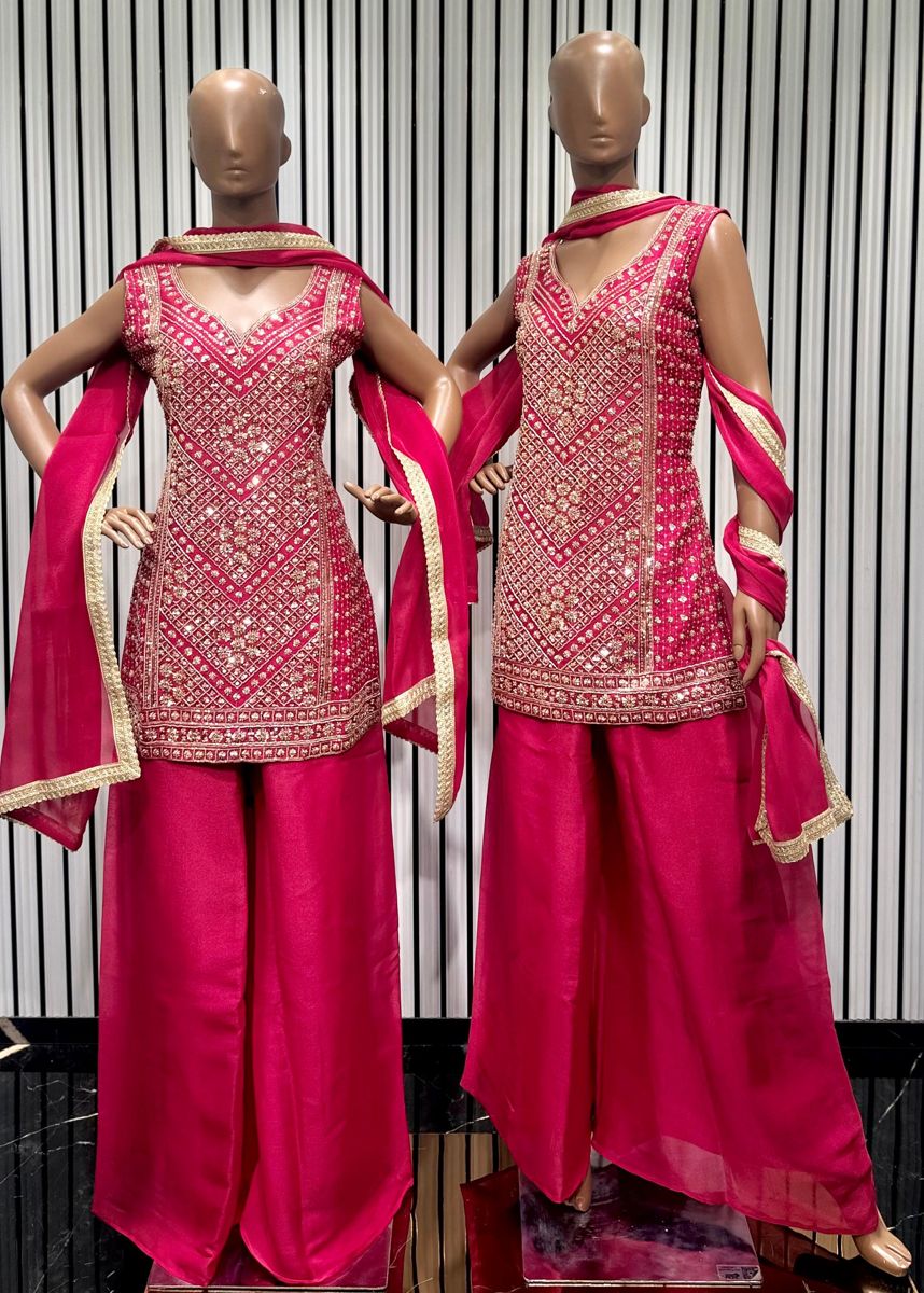 Hot pink V-neck suits with heavy diamond-pattern embroidery